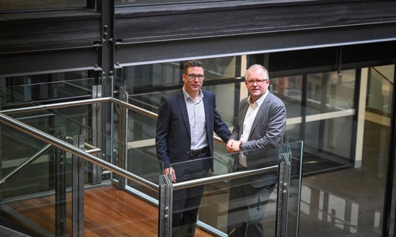 Deakin Vice-Chancellor Professor Iain Martin and GMHBA CEO David Greig..jpg