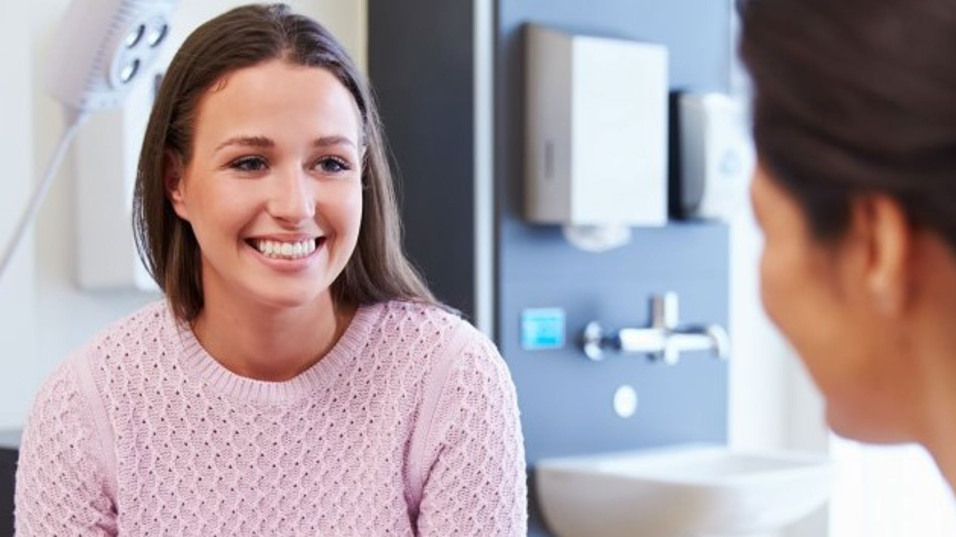 Girl smiling during consultation appointment with choice of own doctor through GMHBA.jpg
