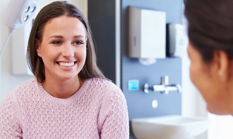 Girl smiling during consultation appointment with choice of own doctor through GMHBA.jpg