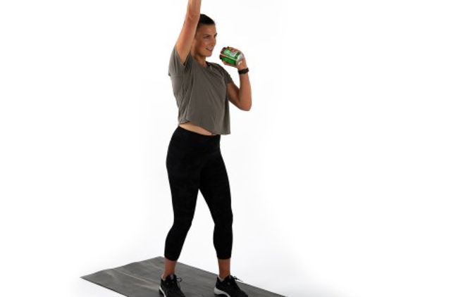 Fit lady overhead boxing as shown on healthier together video