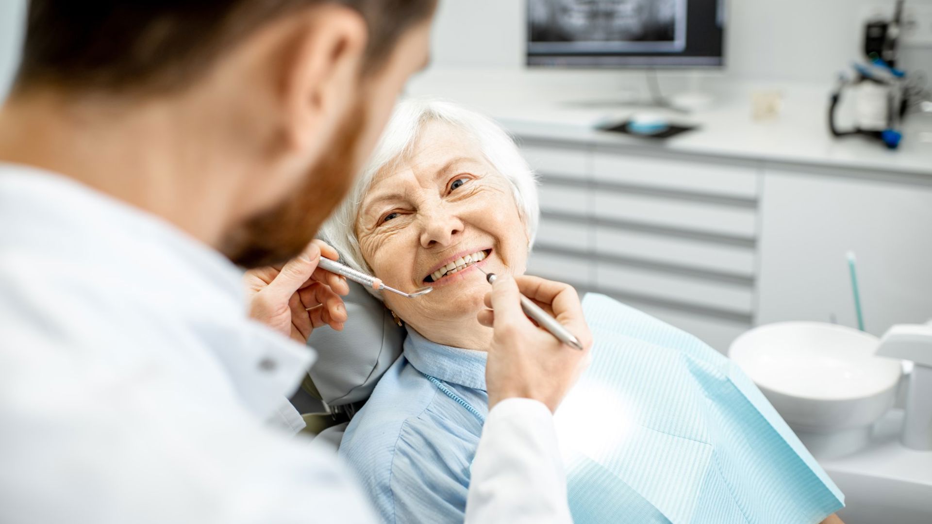 Mature lady getting a dental check-up at GMHBA Dental care