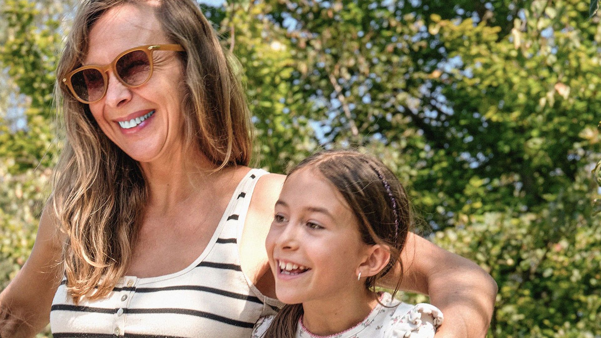 Mum and daughter enjoying time together outdoors during spring