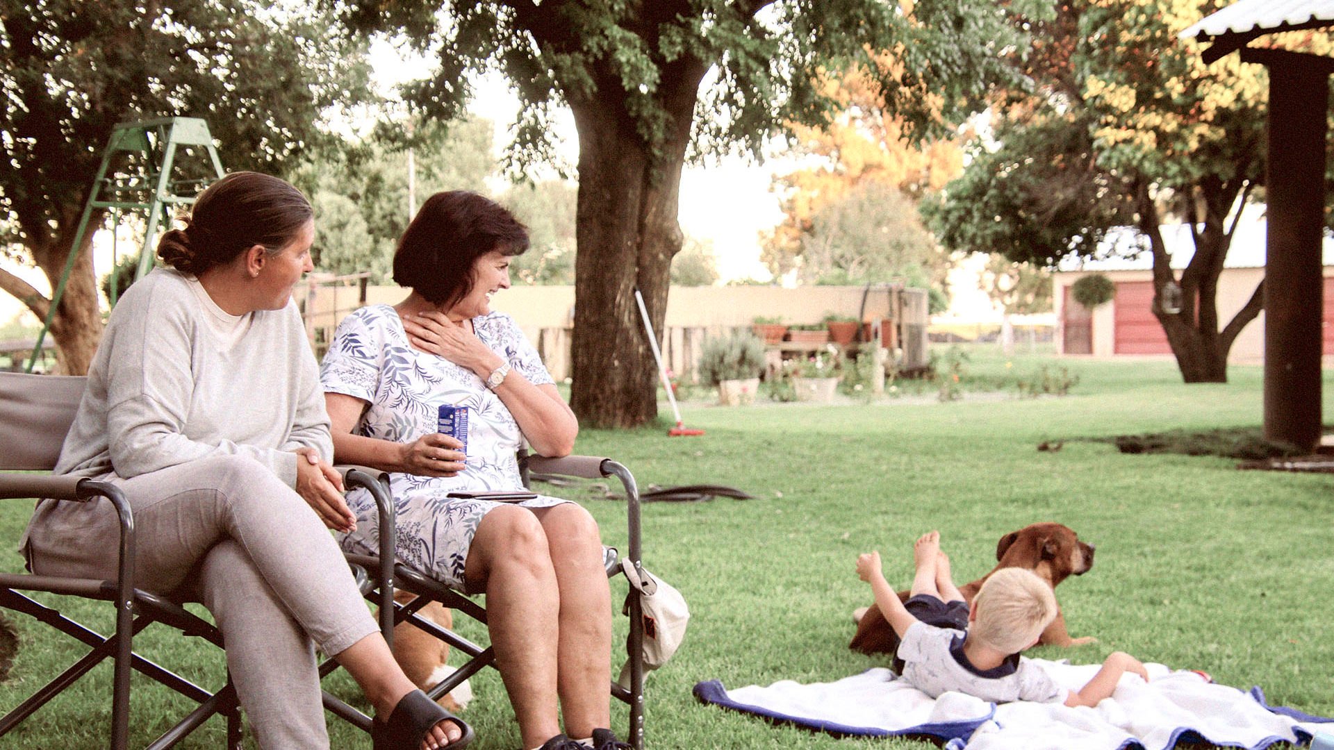 three generations of GMHBA members relaxing in the park
