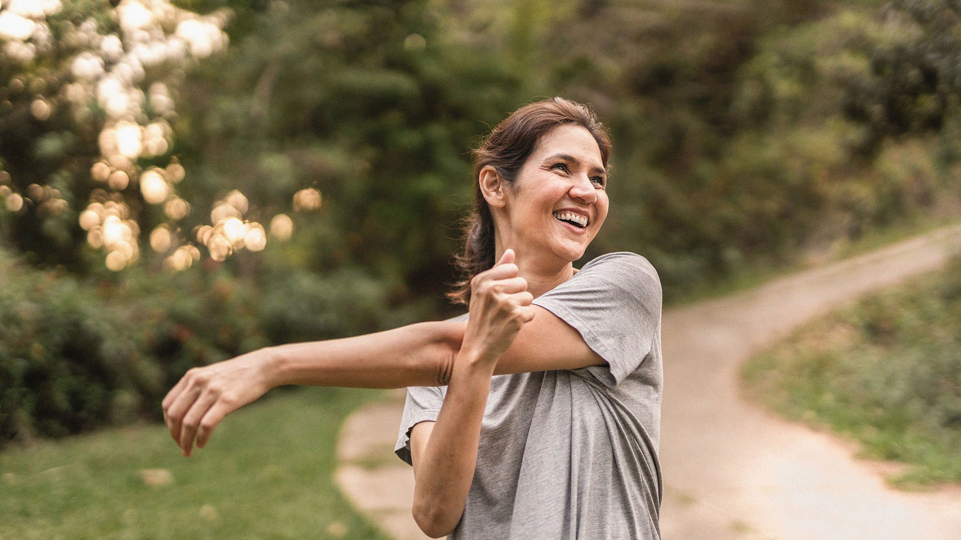 GMHBA member stretching in the park